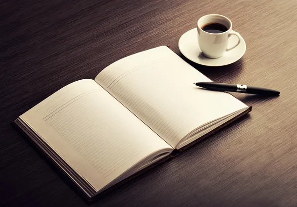 depositphotos_19689431-stock-photo-open-a-blank-white-notebook